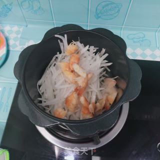 白萝卜虾干粥的做法步骤：6