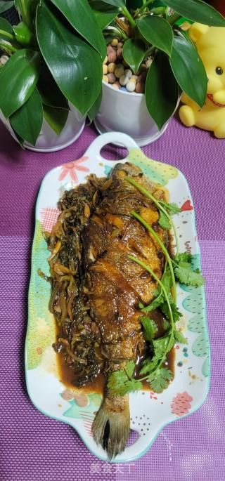 酸菜烧黄花鱼的做法步骤：12