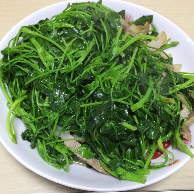 咸肉炒磨盘头（金花菜）